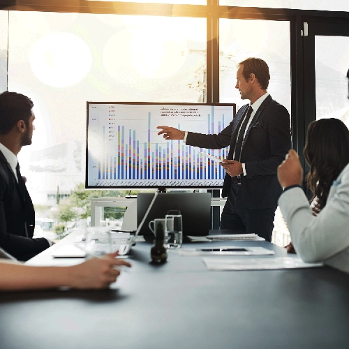 Executives reviewing AI metrics